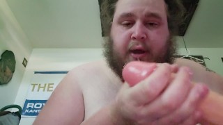 Deepthroating a massive cock