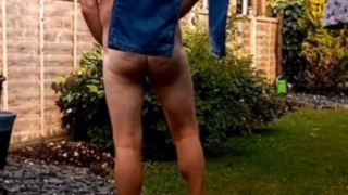 Naked and pissing in the garden 