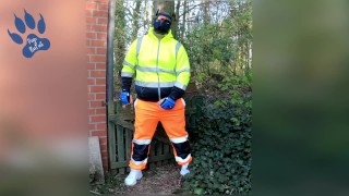 quick pawing off in hi-vis tracksuit and sneakers outdoors