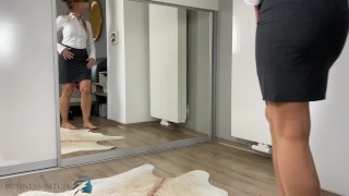business woman dressing for work trying on different panties