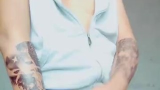 handsome latino boss with tattoos