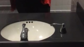 Busty teen plays with boobs at work