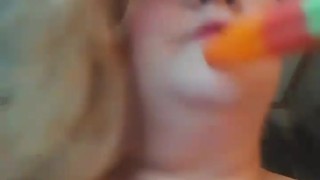 Sucking a "Mom" popsicle