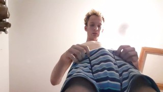 Skinny teen has a massive bulge while wearing his boxers 
