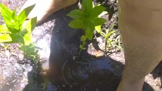  Very Hairy Hirsute Camgirl Shows Hairy Girl Legs Outside in Garden Splashes Muddy Wet Dirty Puddle