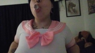 Big tittied goth whore deep throating her toy