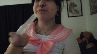 Big tittied goth whore deep throating her toy