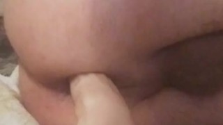 Riding 7 inch dildo on the bed