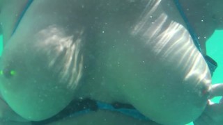 Tits out in the public pool