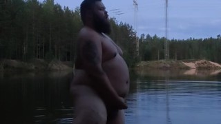 Big bear masturbating in lake