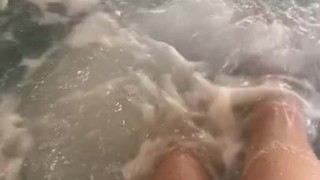 Splashing my feet around in the hotel hot tub
