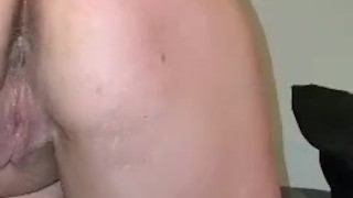 Sukie Rae inserts a butt plug and plays with glass toy.