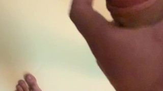 Vigorous dick massage then cum fountain