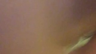 Riding a black dildo 