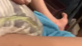 Diaper boy laying In Full diaper