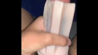 Teen plays with his new fleshlight