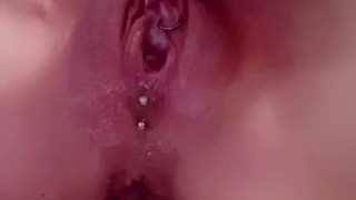 Myra vibrates her clit to squirting orgasm. 