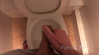 Pissing in a public toilet