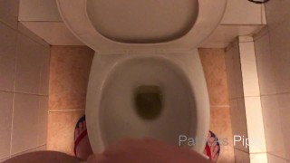 Pissing in a public toilet