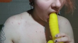Goth tries to do a double blow job with dildos