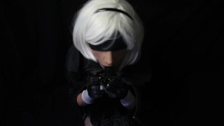 Silicone doll with 2B cosplay gives blowjob to strapon