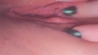 Masturbating