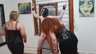 Dominatrix Duo Beats Slave's Cock With Floggers, Riding Crops, and Canes 