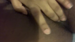 Ebony girl plays with her hairy pussy