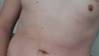 Small cock trans girl pissing on herself