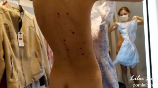 Naked girl in a fitting room.