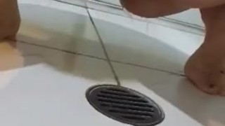 Amateur bathroom floor panty pee