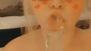 Blonde slut makes herself cum on a clear cock