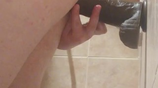 Sissy in chastity fucks huge dildos