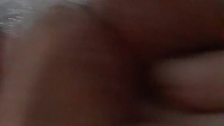 Horny milf plays with her clit in bubble bath