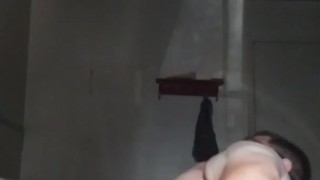 Chubby teen fucking his ass with a black dildo