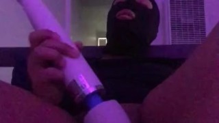 Moaning masked slut fucks herself until she cums