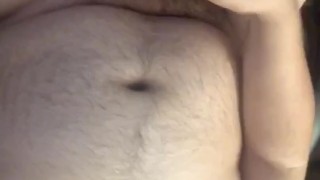 Chubby dude blows a fat load with his toy 