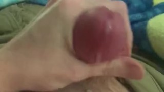 Naughty puppy pawing at himself 