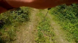 Risky long naked walk on trail beside river and road 