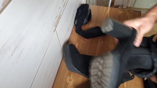 Cumming on her ankle boots