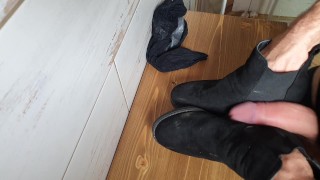 Cumming on her ankle boots