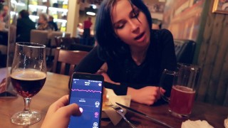 I took control of my stepsister's vibrator in the bar and brought her to orgasm.