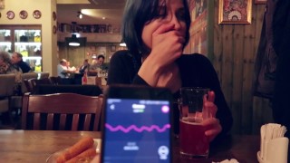 I took control of my stepsister's vibrator in the bar and brought her to orgasm.