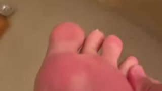 Spreading my toes In the shower 