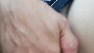 MILF masturbates by the water