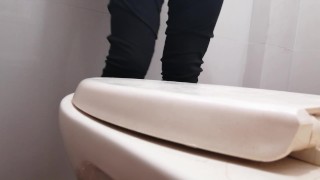 I film my friend peeing standing in my bathroom. 