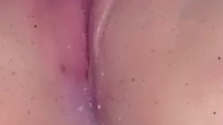 Playing with her pussy after creampie 