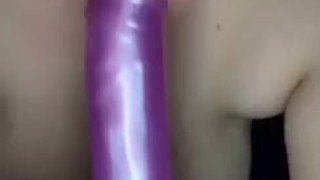 Girl with glasses sucking off a toy