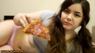 Bored Girl Chews On Pizza