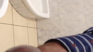 Jerking dick and piss in the toilet